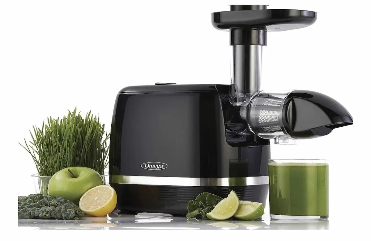 best cold press juicer omega h3000d cold press juicer black Omega H3000D horizontal cold press juicer on clean kitchen counter, best cold press juicer for leafy greens